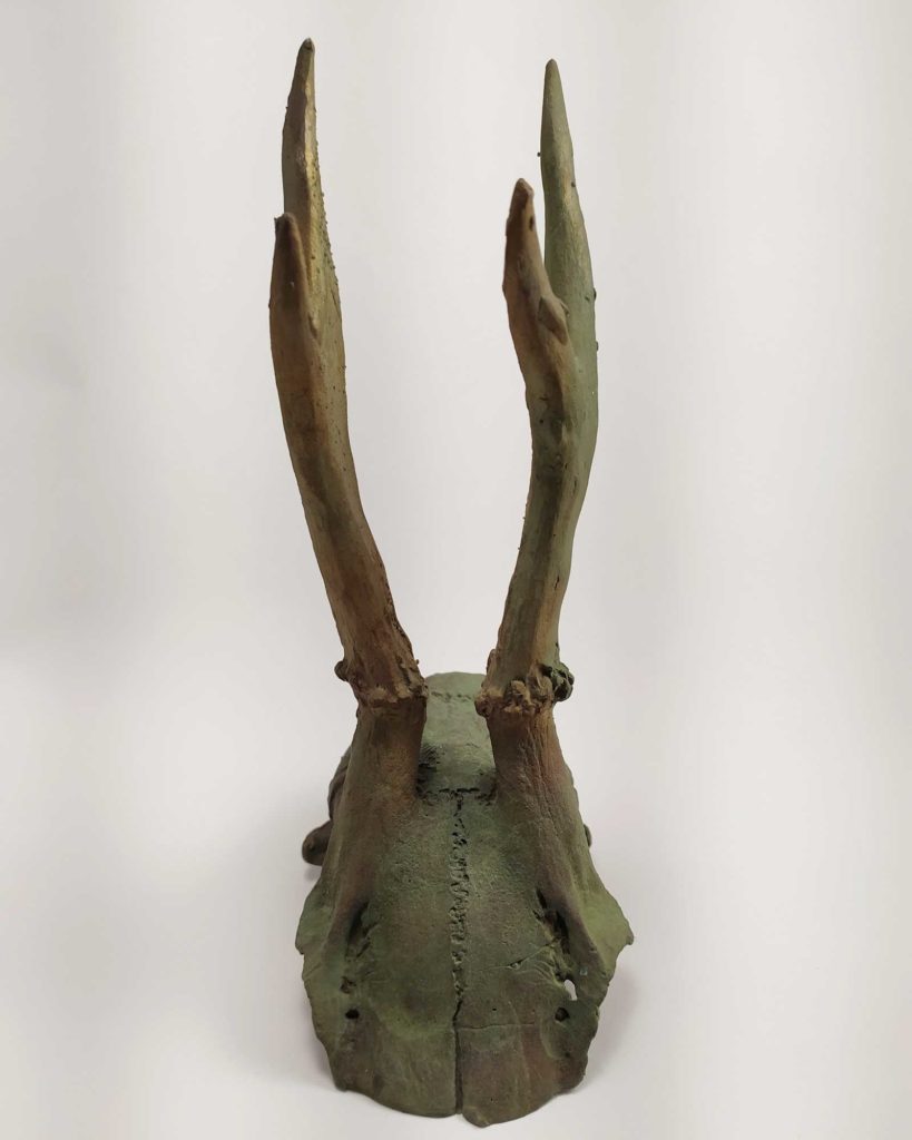 Bronze sculpture of a skull molded from a skull found in the Czech Republic