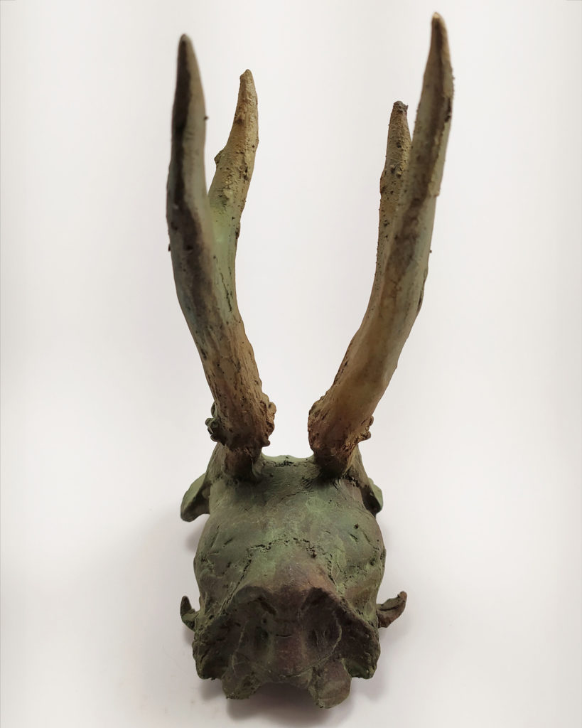 Bronze sculpture of a skull molded from a skull found in the Czech Republic